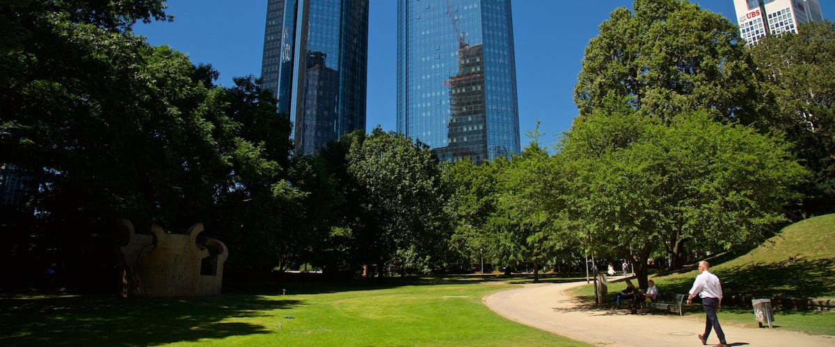 Deutsche Bank Twin Towers which includes a park and a high rise building
