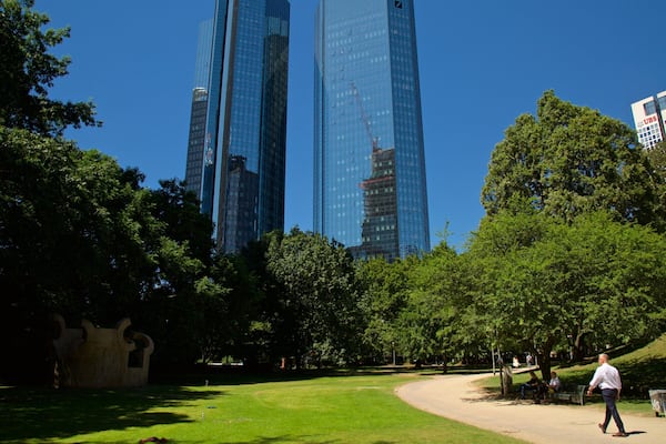 Deutsche Bank Twin Towers which includes a park and a high rise building