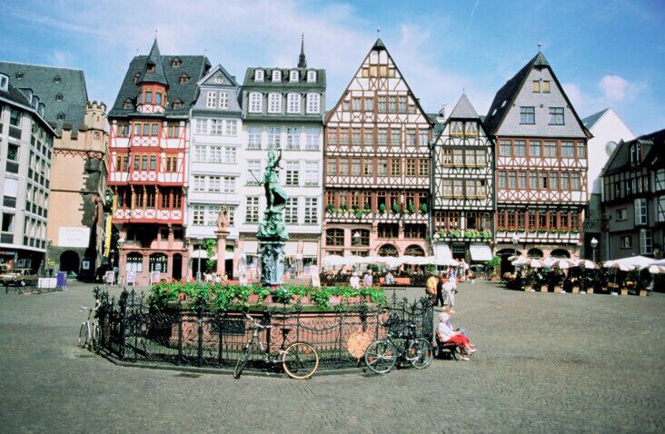 Statue in front of buildings, Romerberg Square, Frankfurt, Germany