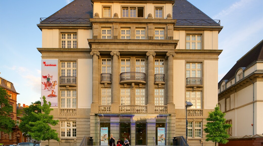 German Film Museum showing signage, heritage architecture and a sunset