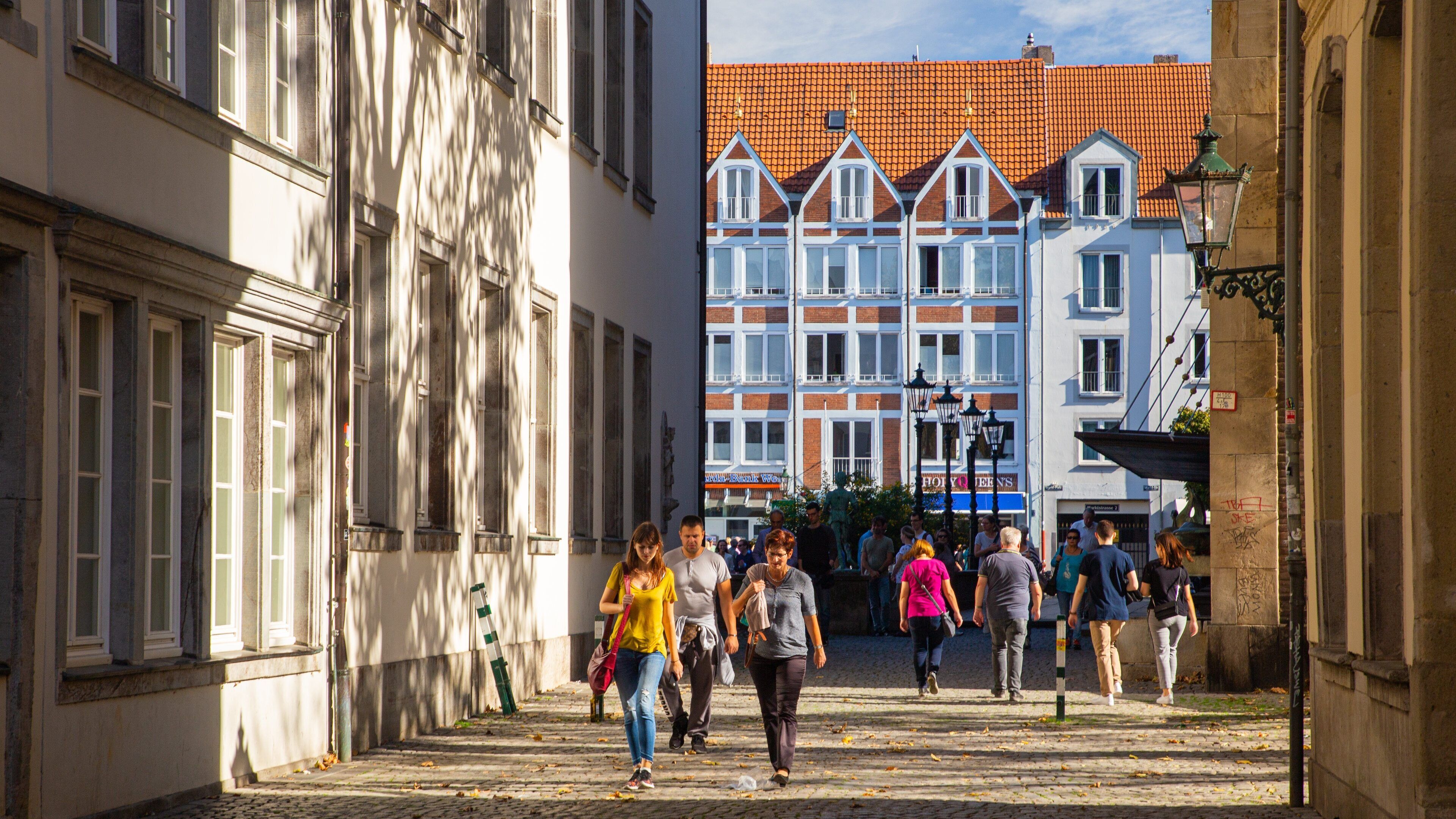 Düsseldorf Government Region which includes a city and street scenes as well as a small group of people