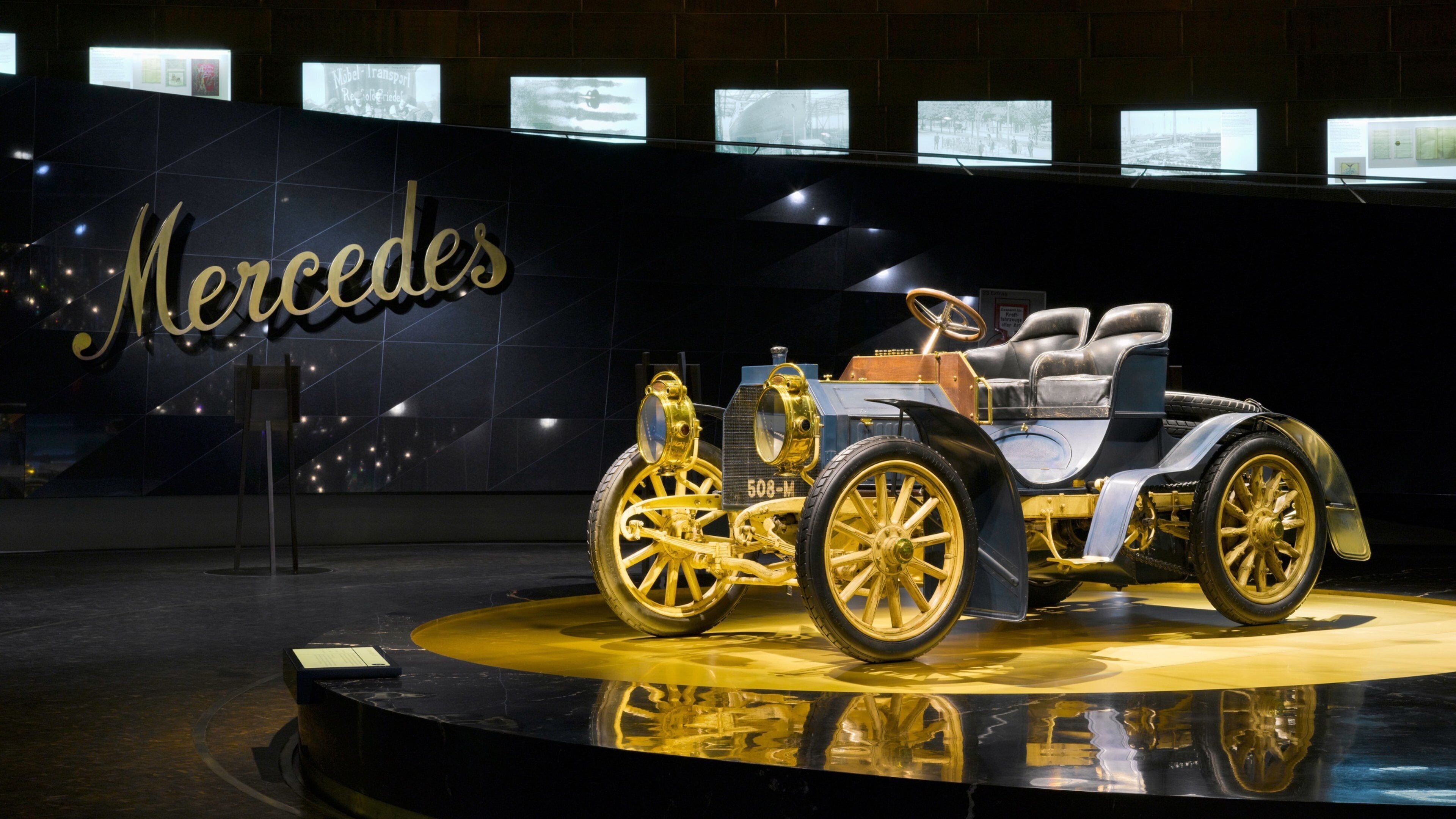 Mercedes Benz Museum featuring signage and interior views