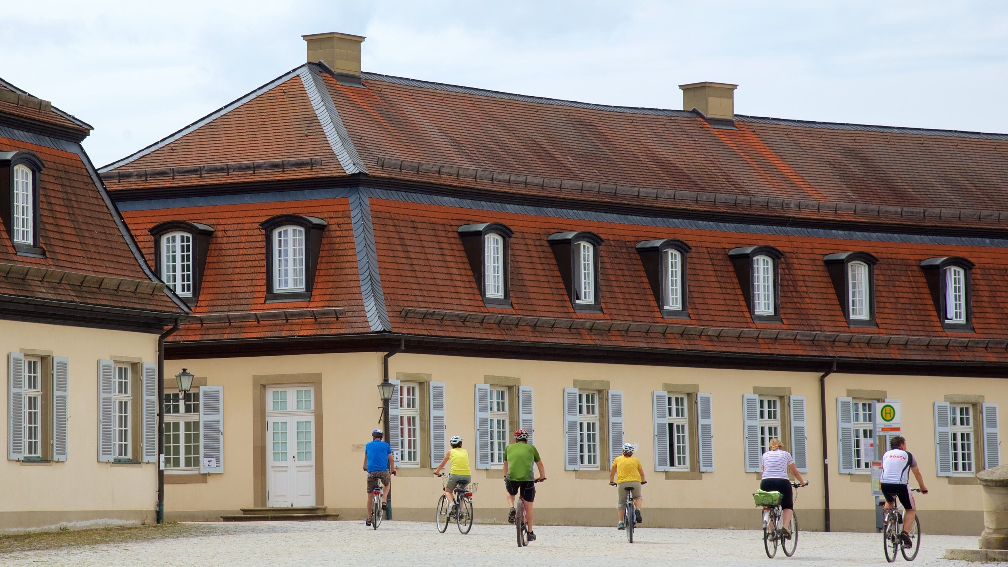 Solitude Palace showing cycling and a square or plaza
