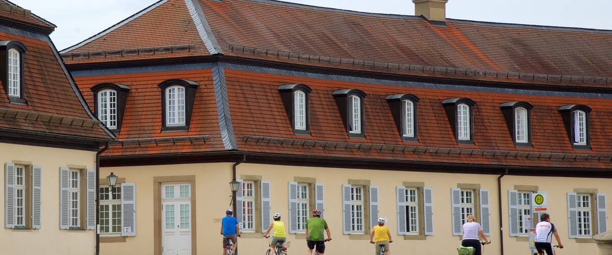 Solitude Palace showing cycling and a square or plaza