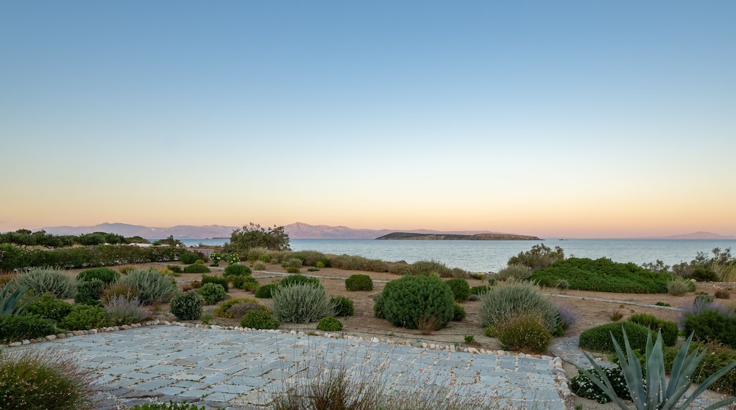 Panoramic view on Naxos island from Paros Island at sunset. Typical mediterranean vegetation. soft pastel colors.