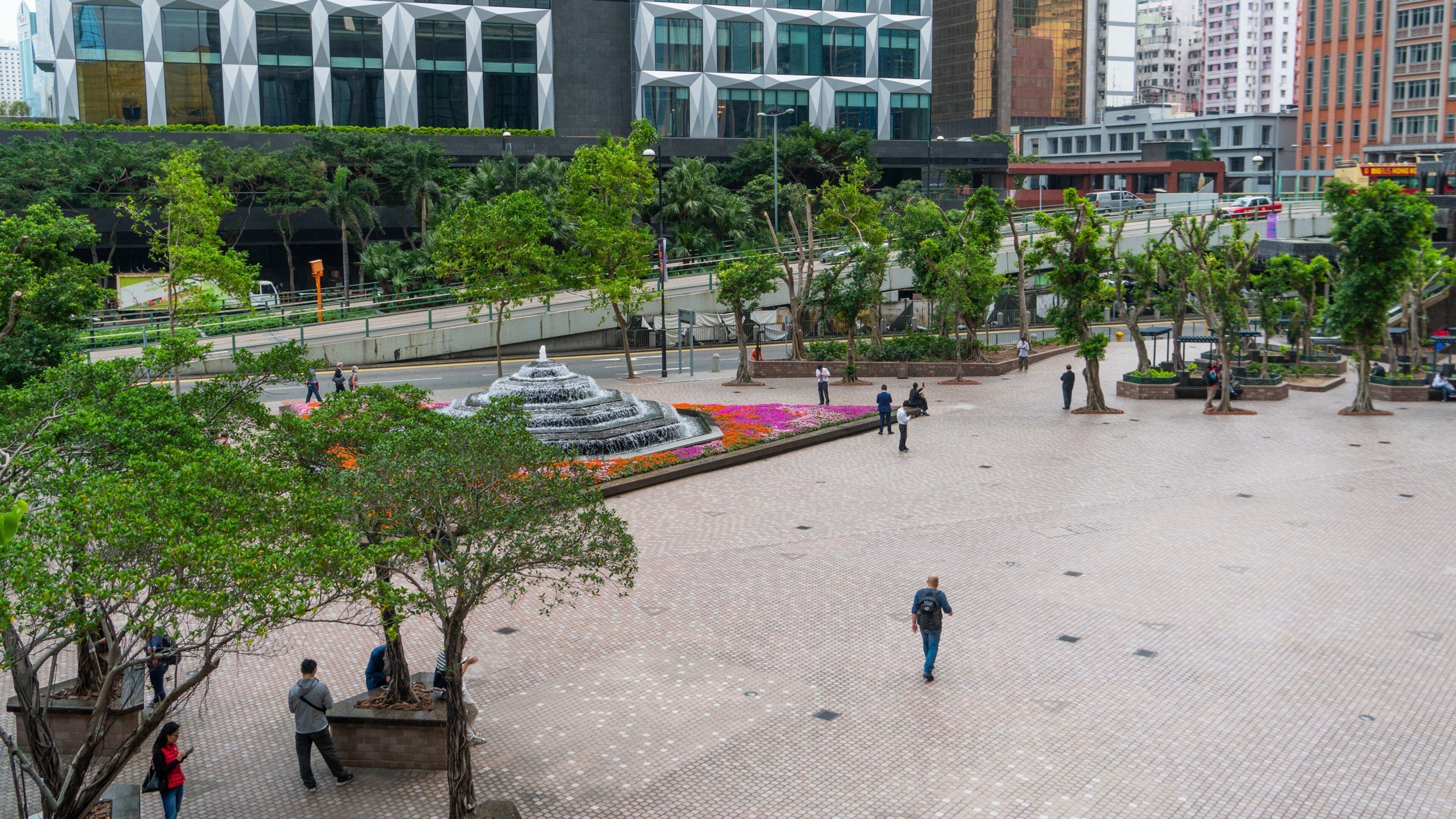 Central Plaza featuring a fountain and a square or plaza