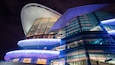 Hong Kong Convention and Exhibition Centre showing night scenes and modern architecture