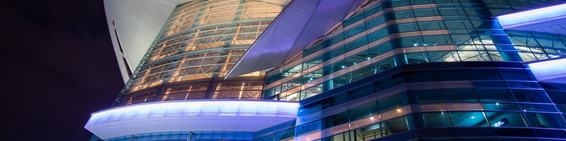 Hong Kong Convention and Exhibition Centre showing night scenes and modern architecture