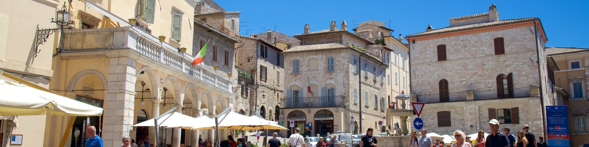 Piazza del Comune featuring a city, cafe scenes and street scenes