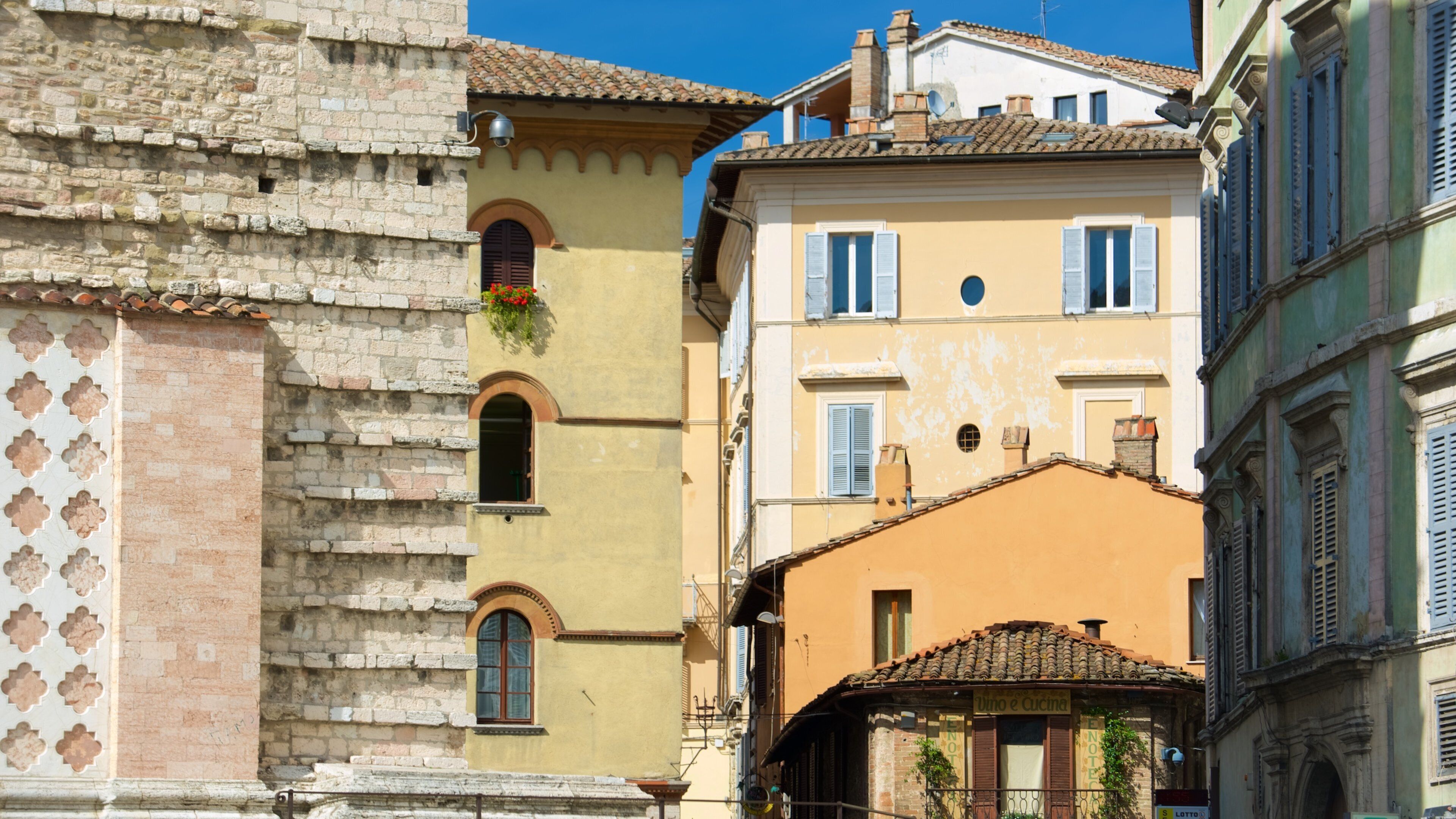 Piazza IV Novembre which includes a city and heritage architecture