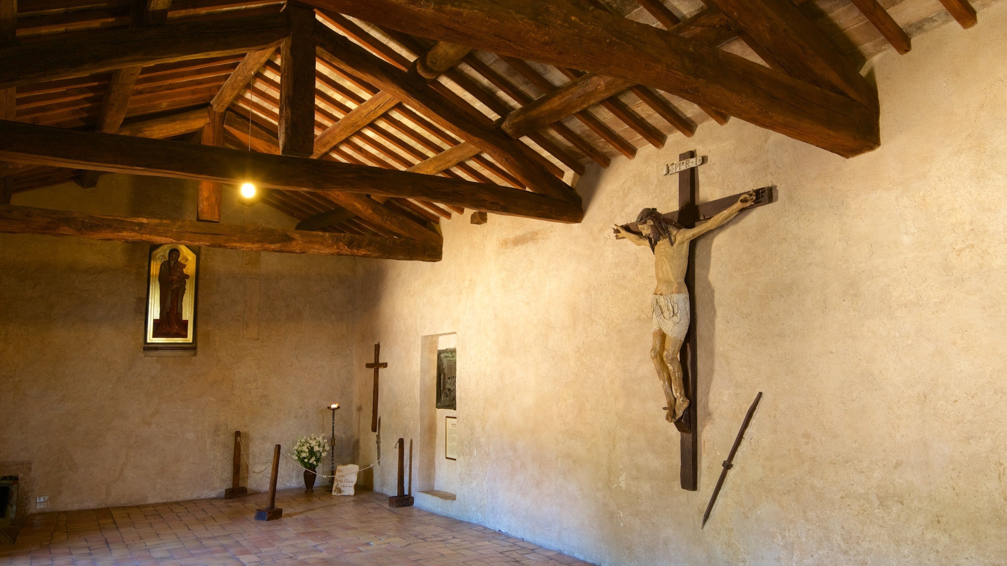 San Damiano which includes religious aspects, a church or cathedral and interior views