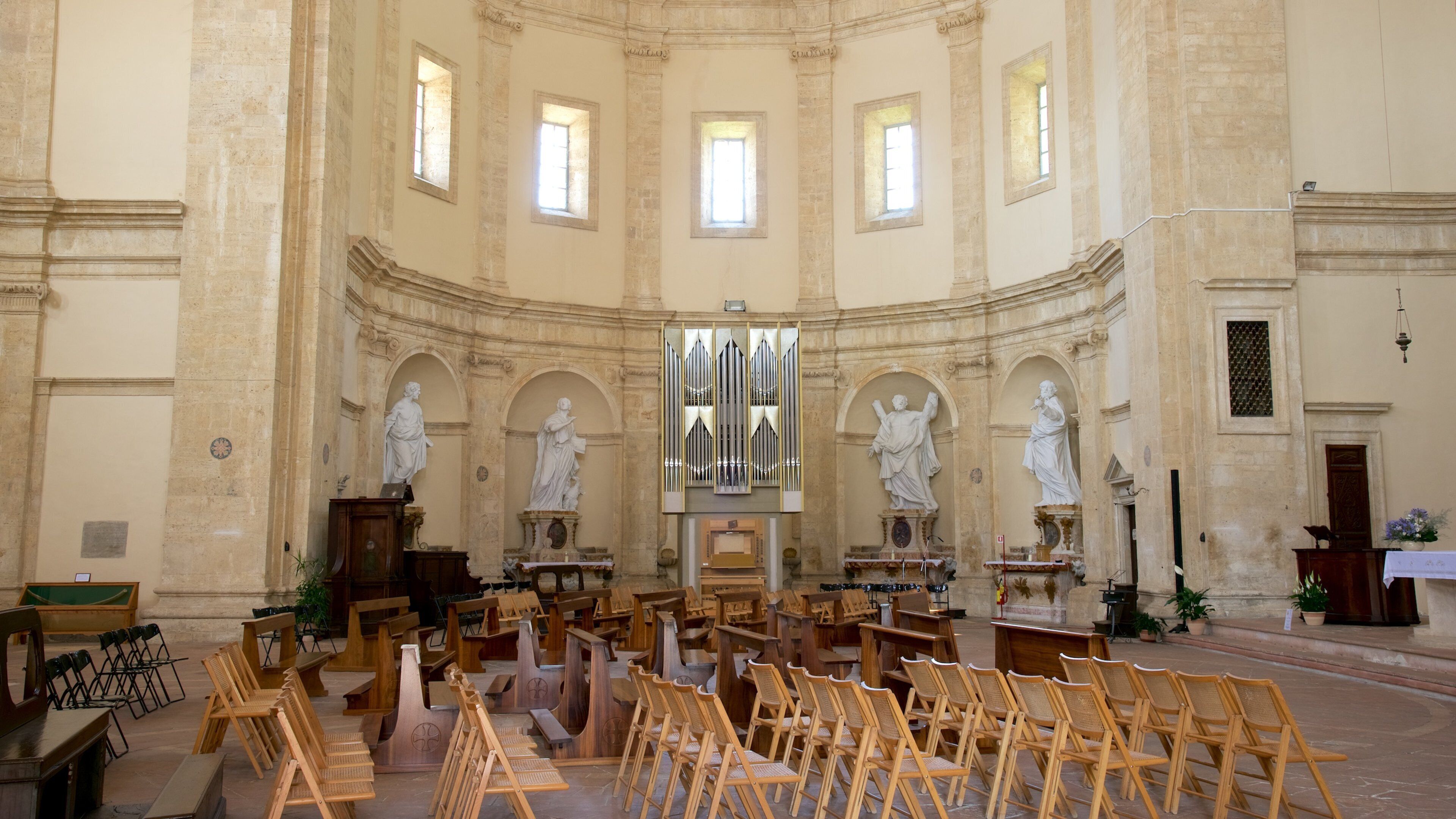 Santa Maria della Consolazione which includes interior views, a statue or sculpture and a church or cathedral