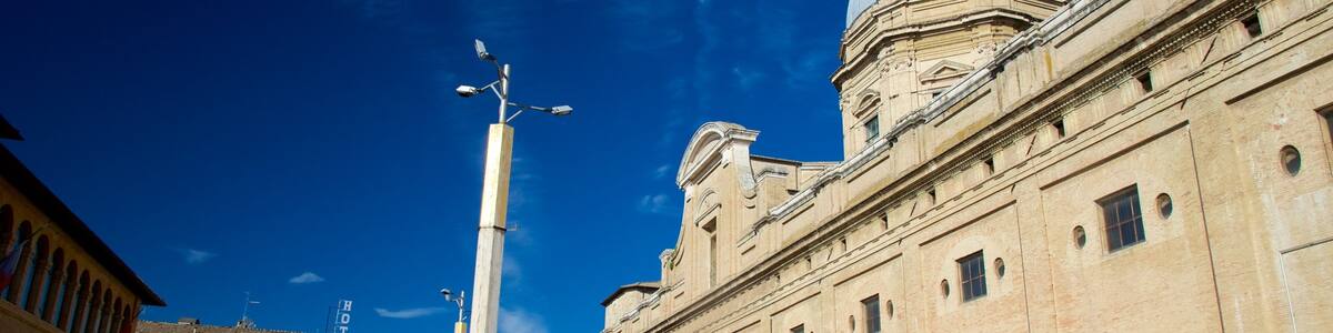 Santa Maria degli Angeli which includes heritage architecture, a city and a church or cathedral