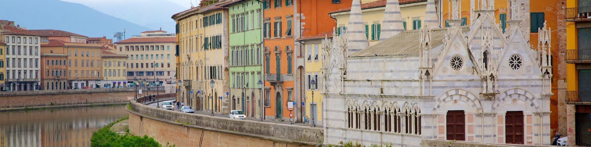 Santa Maria della Spina which includes a river or creek, a city and heritage architecture