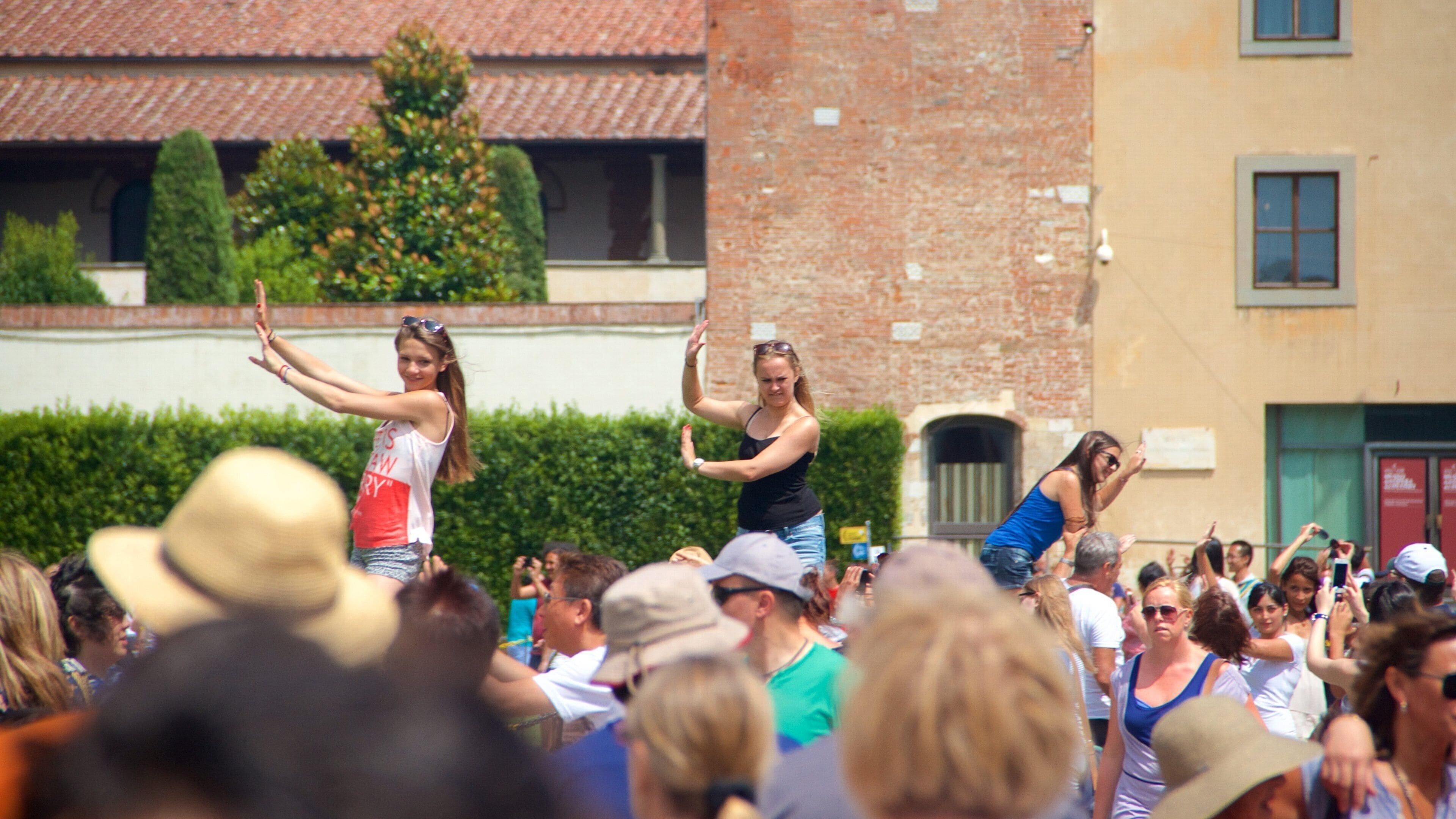 Pisa as well as a large group of people