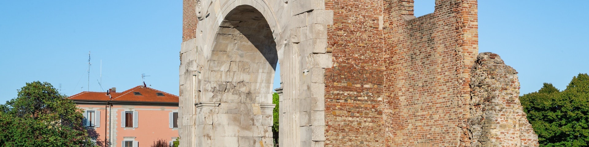 Arch of Augustus showing a ruin and heritage elements
