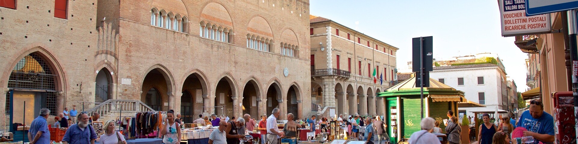 Piazza Cavour which includes markets, heritage architecture and street scenes