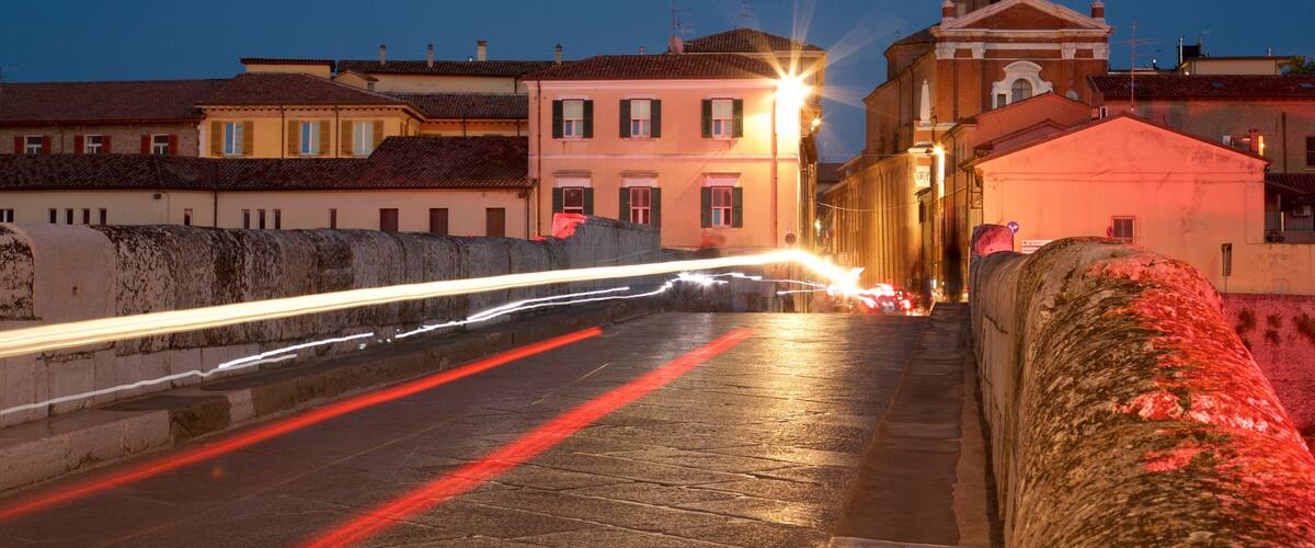 Tiberius Bridge which includes a small town or village, a bridge and night scenes
