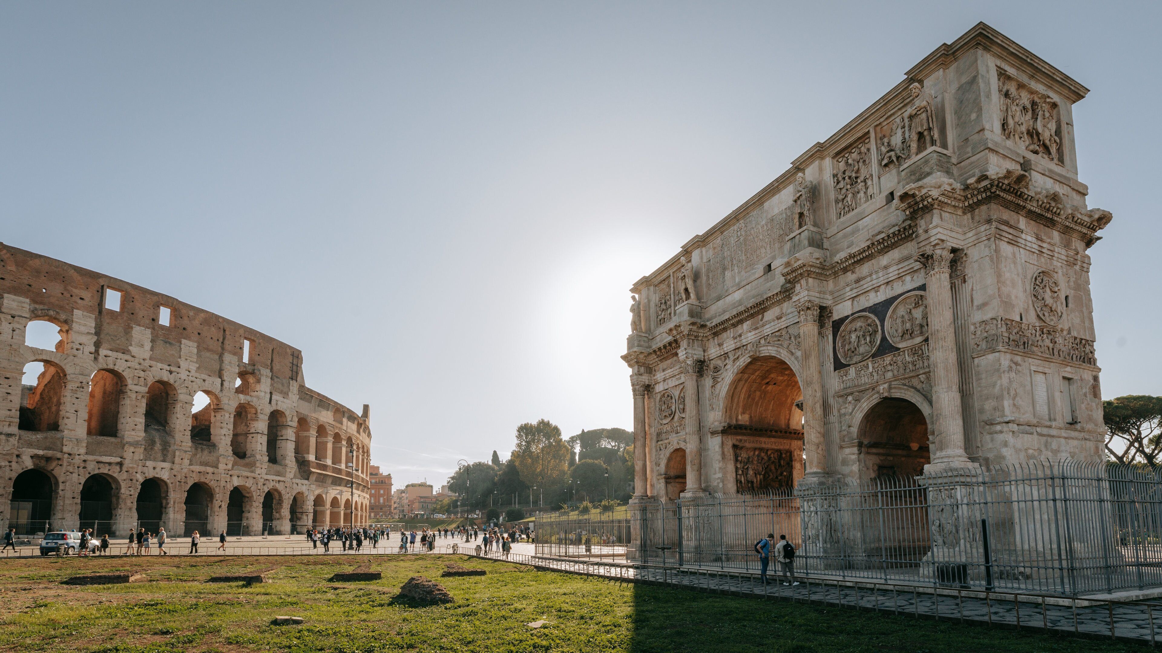 Arch of Constantine which includes heritage architecture, a monument and a sunset