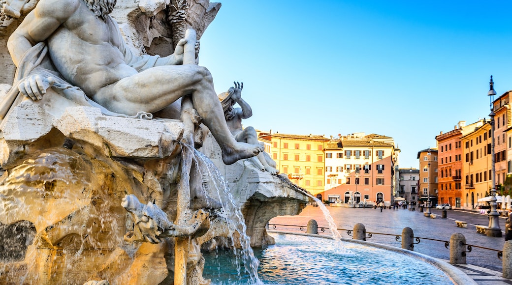 Rome, Italy. Fountain of the Four Rivers (Fontana dei Quattro Fiumi) with an Egyptian obelisk in Piazza Navona.; Shutterstock ID 390232801; Purchase Order: -