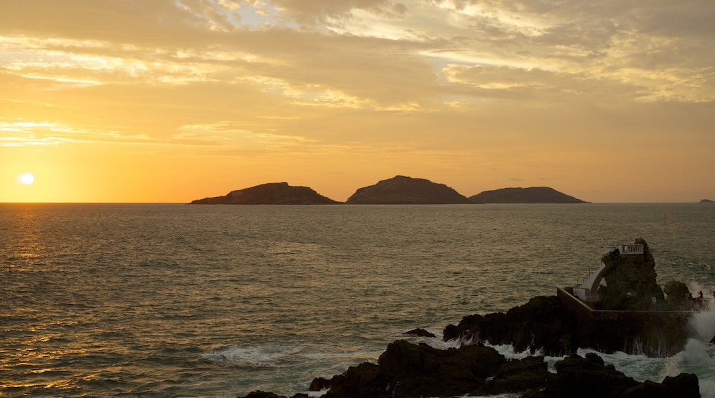 Olas Altas Beach which includes rugged coastline, landscape views and island views