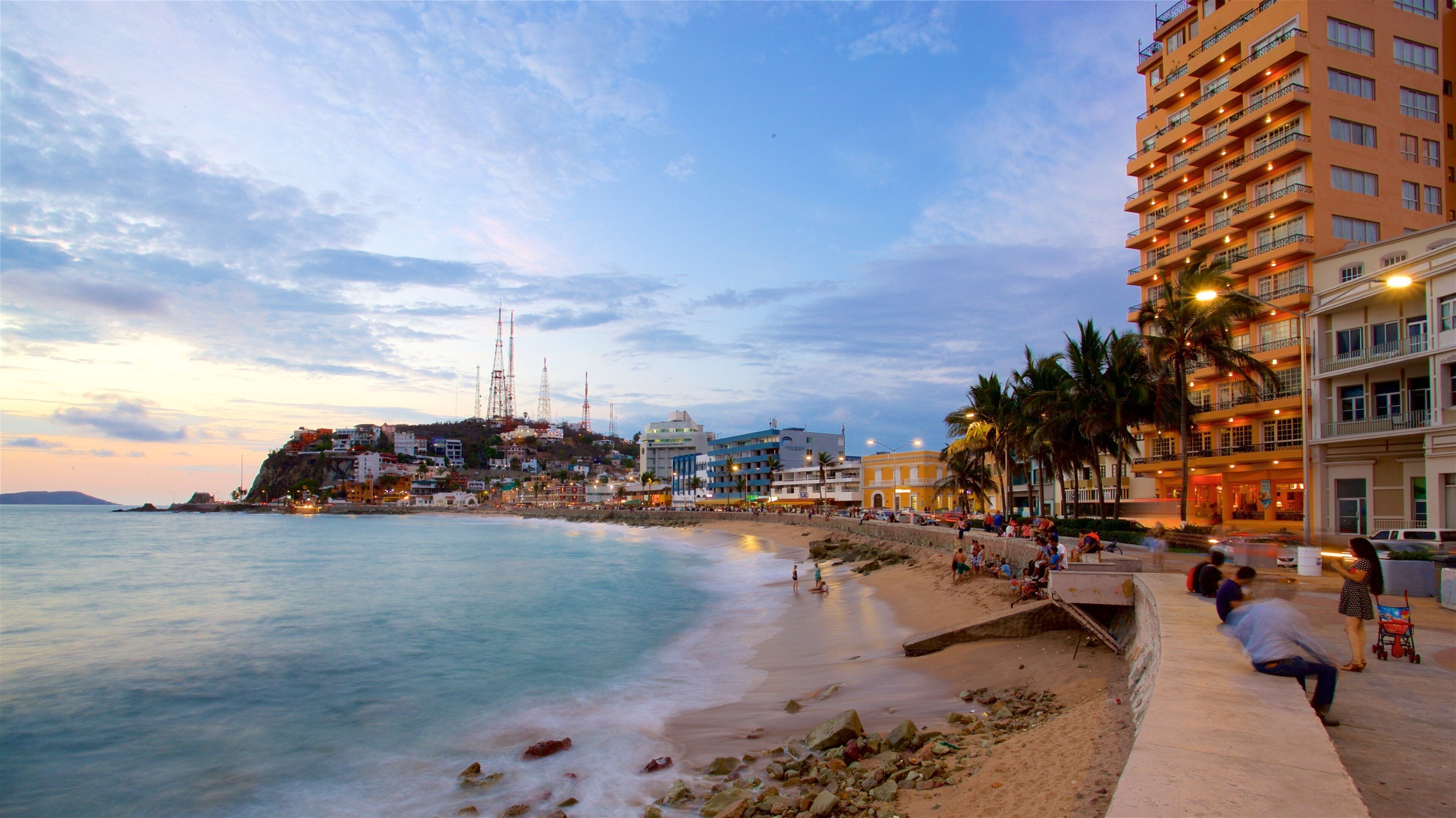 Olas Altas Beach featuring general coastal views, a sandy beach and a sunset