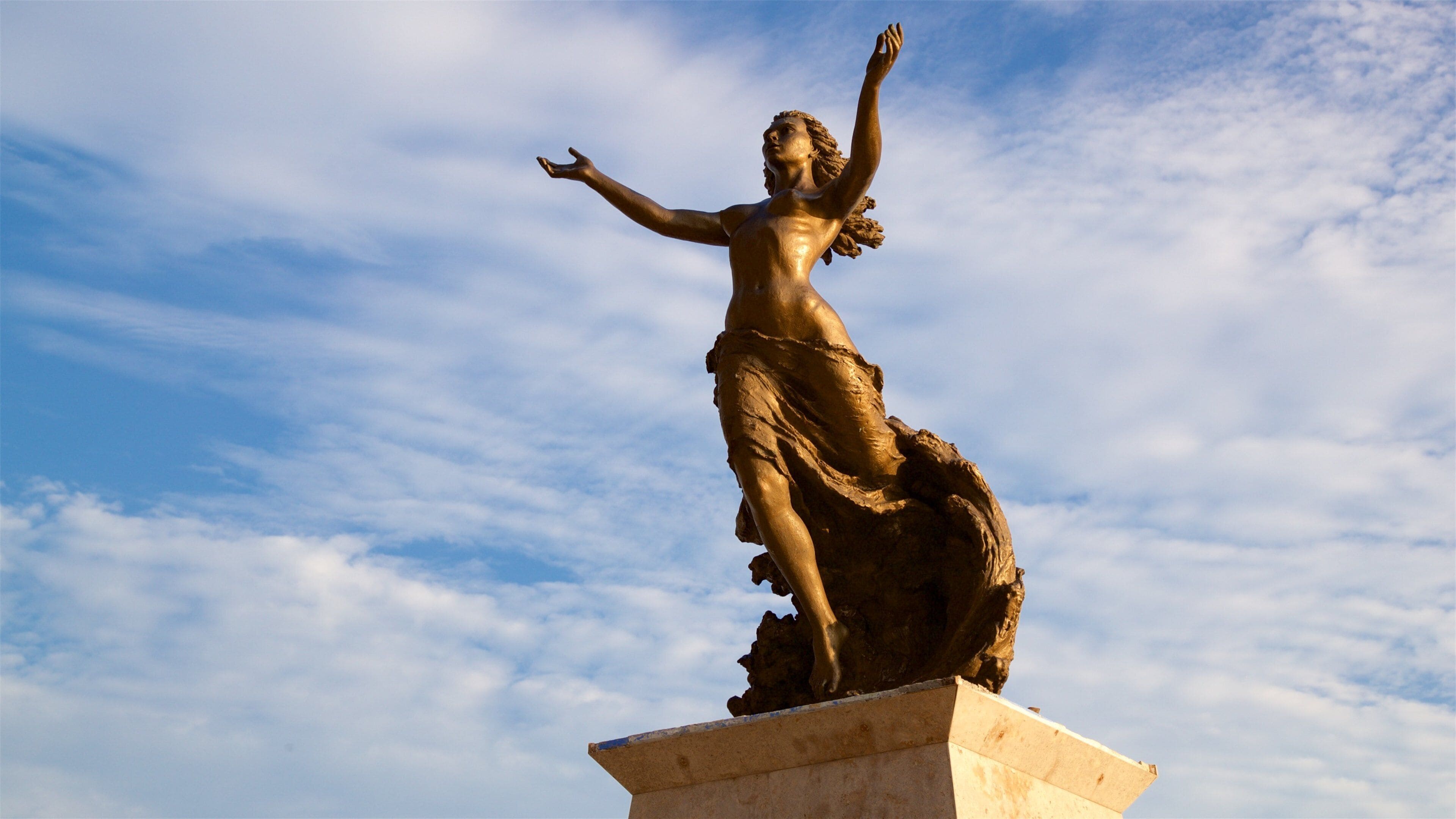 Punta de Clavadistas toont een standbeeld of beeldhouwwerk