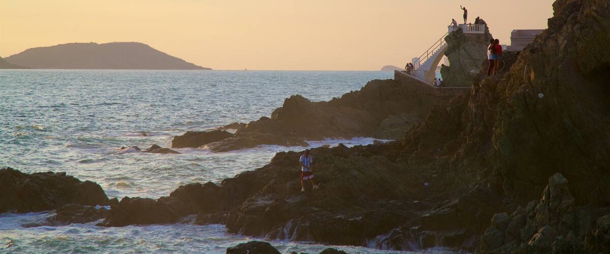 Divers Point which includes general coastal views, views and a sunset