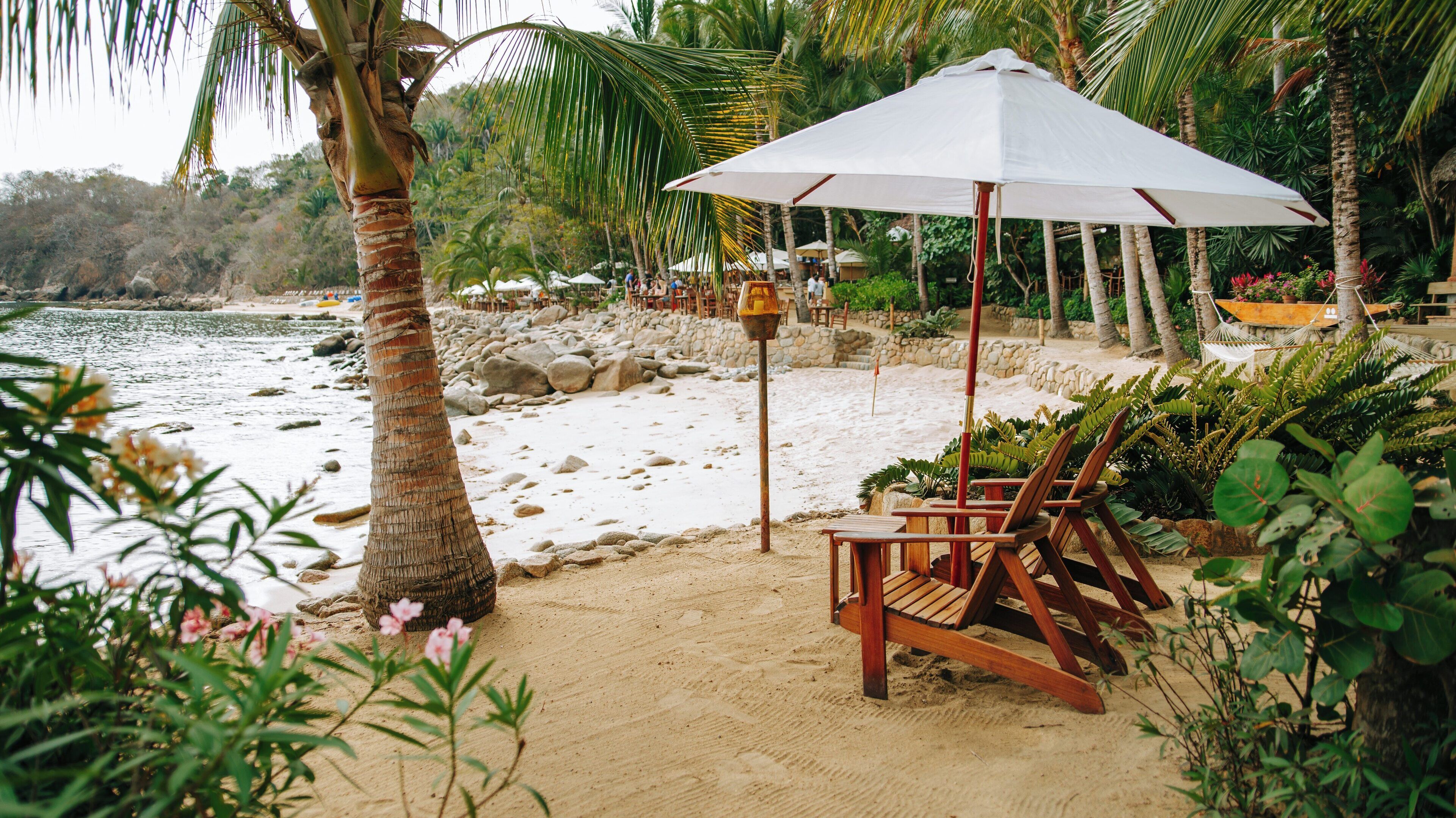 Relaxing at Las Caletas Beach in Quimixto, Jalisco, Mexico, offers a perfect getaway with stunning views and tranquil surroundings