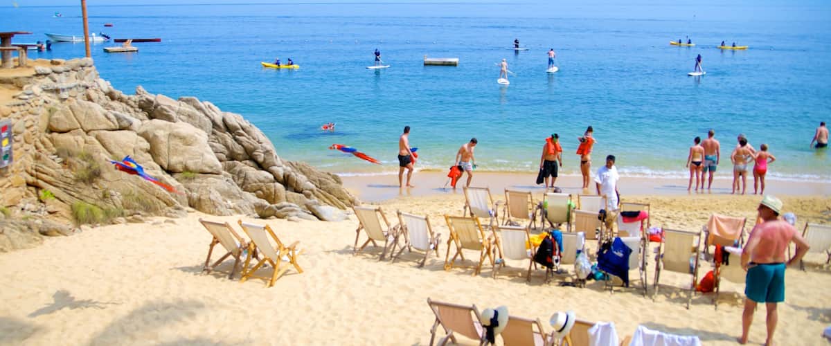 Las Caletas showing kayaking or canoeing and a beach as well as a large group of people