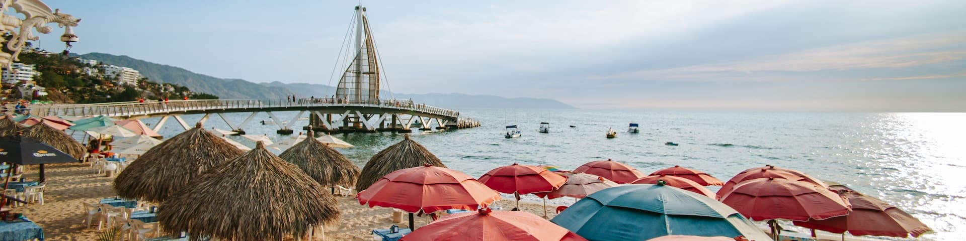 Bay of Banderas showing general coastal views, a sunset and a sandy beach