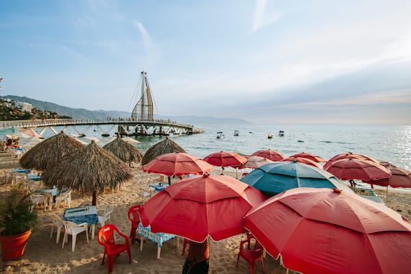 Bay of Banderas showing general coastal views, a sunset and a sandy beach