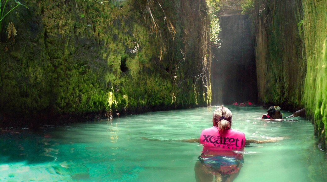 Xcaret Eco Theme Park showing swimming, rides and landscape views