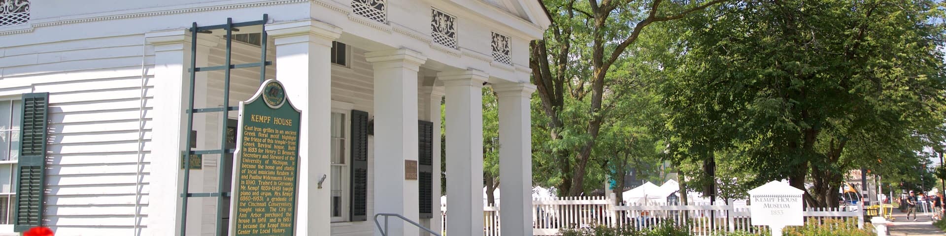 Kempf House showing wildflowers and a house