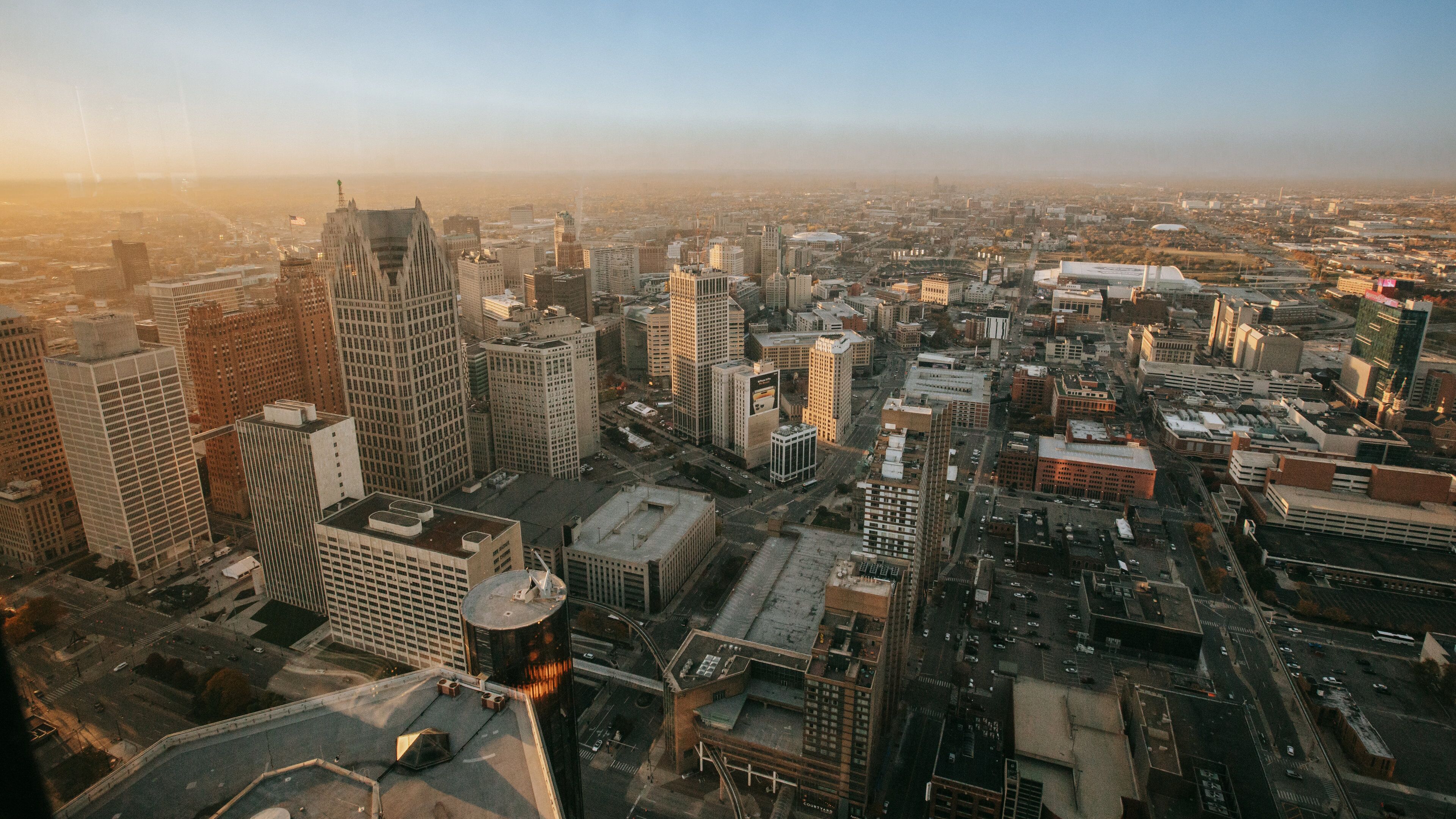 GM Renaissance Center featuring a sunset, a city and landscape views