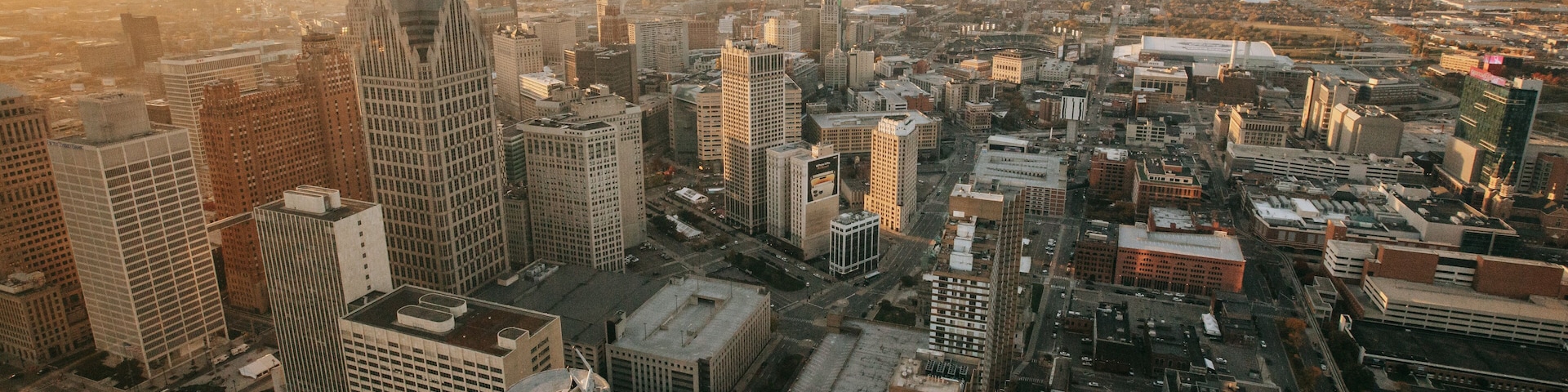 GM Renaissance Center featuring a sunset, a city and landscape views