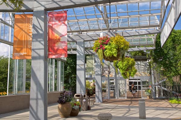 Frederik Meijer Gardens and Sculpture Park featuring flowers and signage