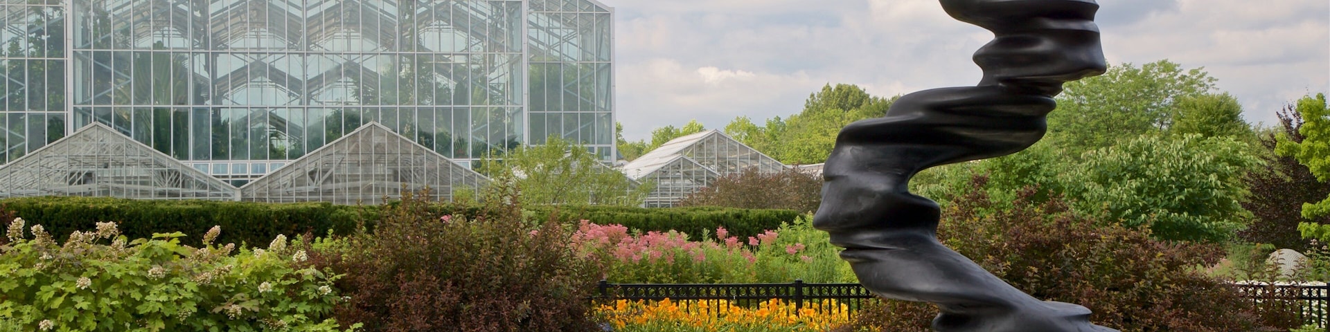 Frederik Meijer Gardens and Sculpture Park featuring wildflowers and outdoor art