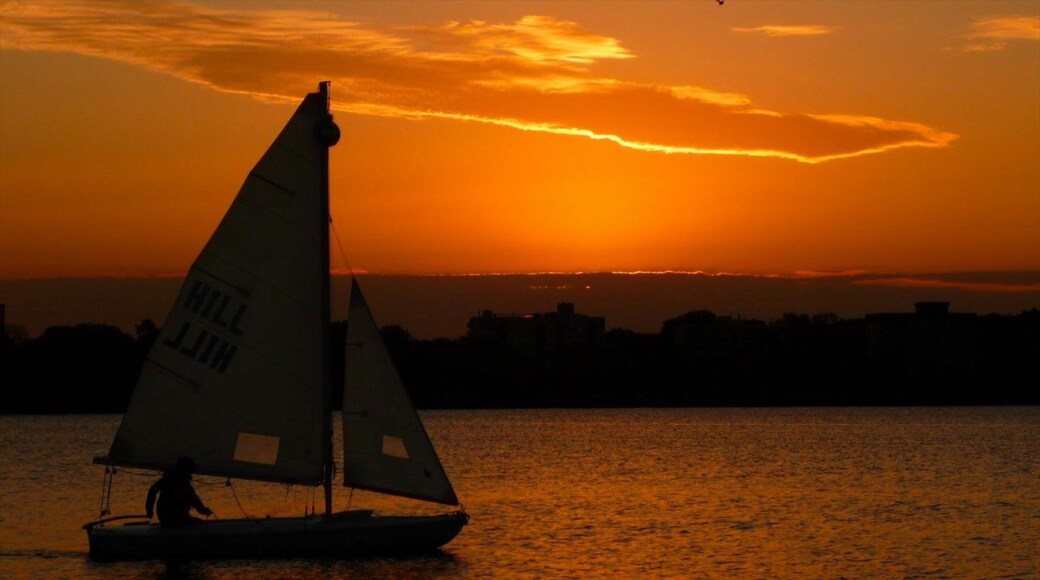 Bde Maka Ska which includes a sunset, night scenes and sailing