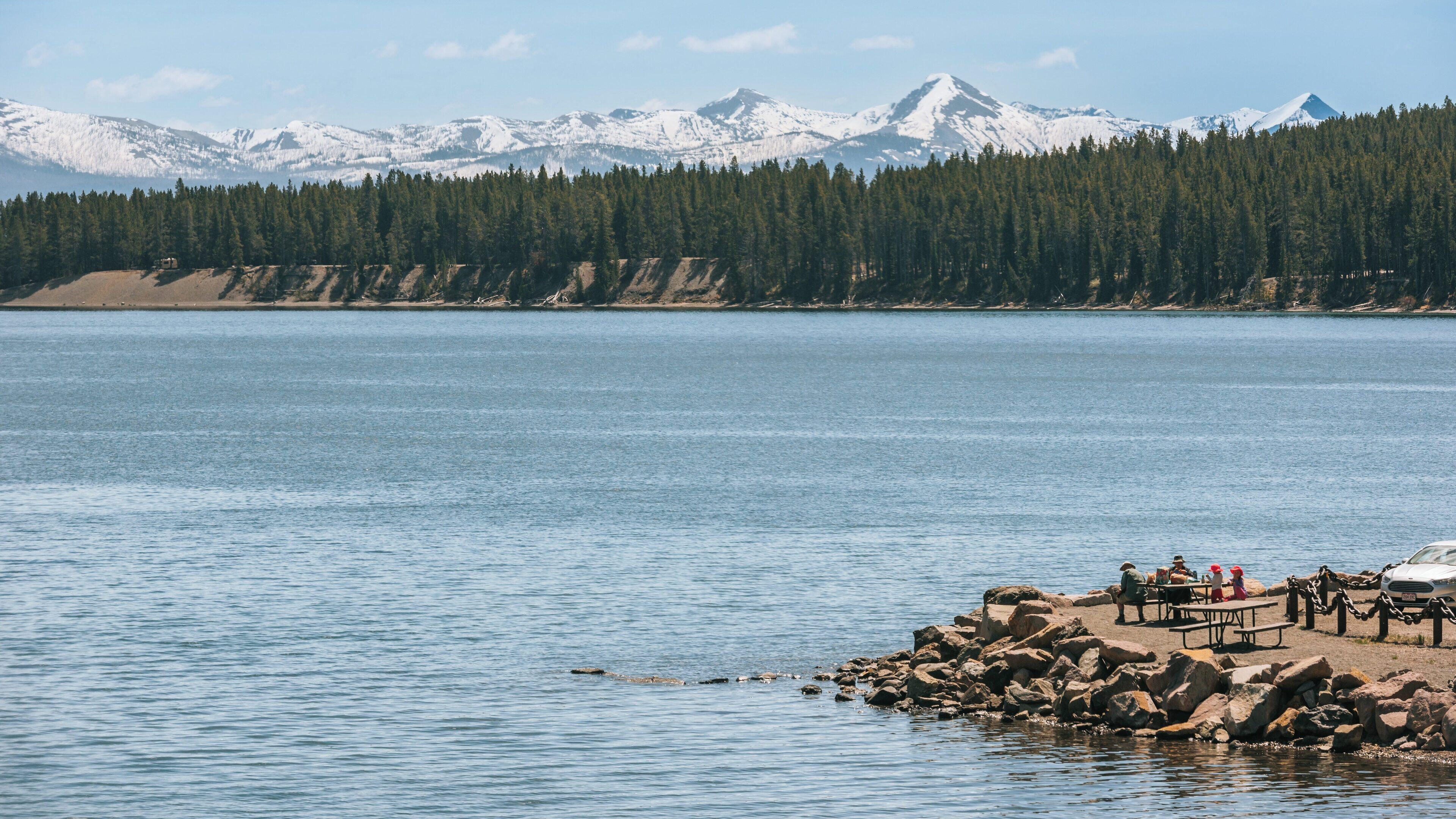 Exploring West Thumb at Yellowstone Lake in Yellowstone National Park, Wyoming on a clear mountain day