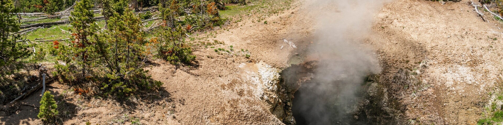 Dragon\'s Mouth Springs which includes mist or fog and a hot spring