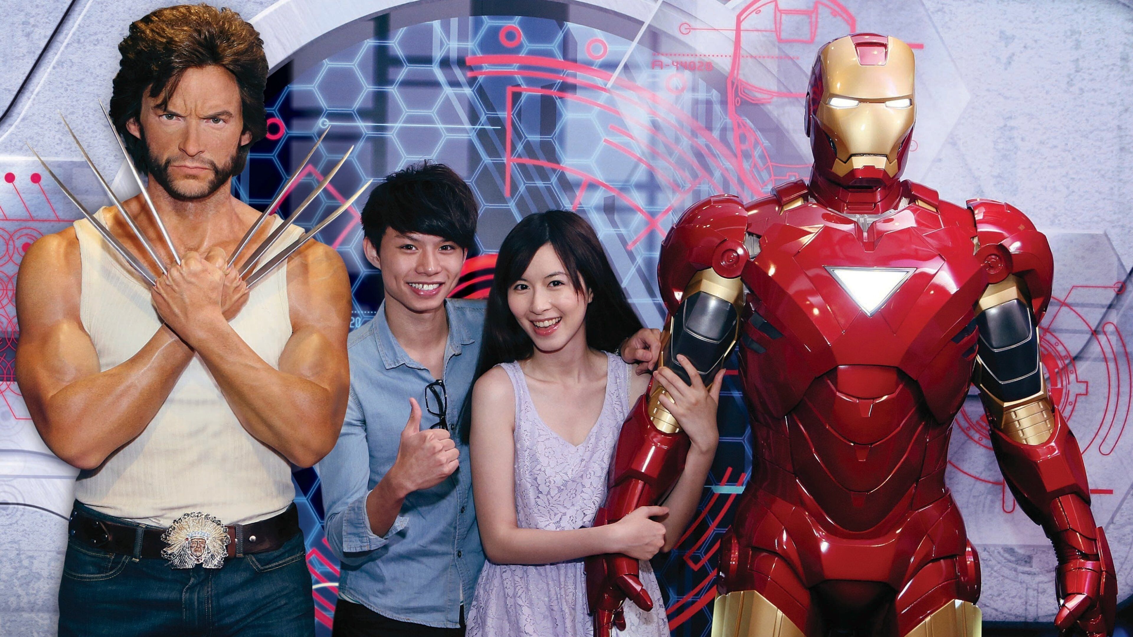 Madame Tussauds showing art and interior views as well as a couple