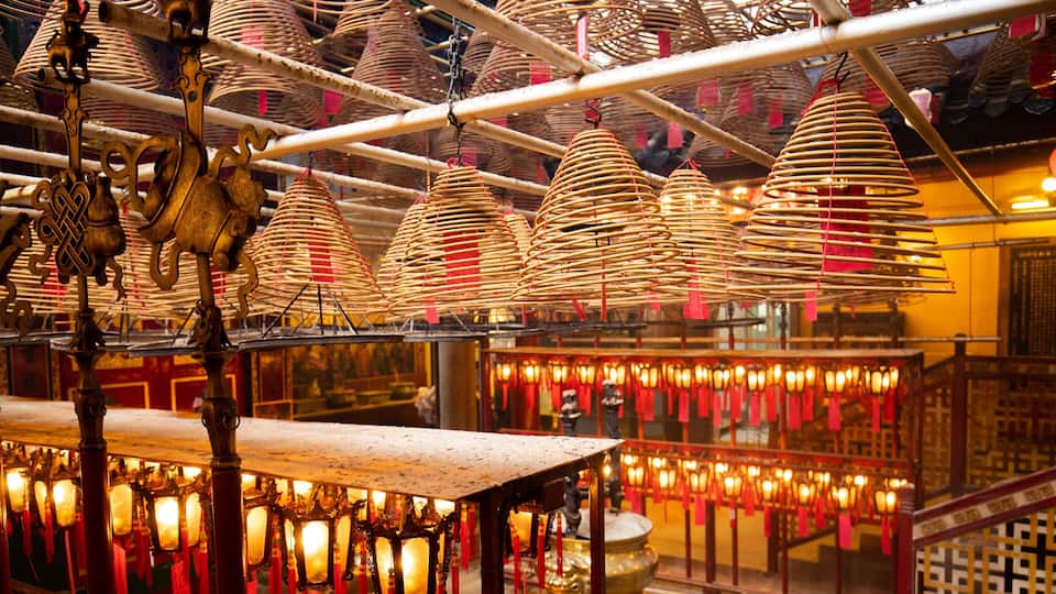 Man Mo Temple which includes interior views, heritage elements and a temple or place of worship