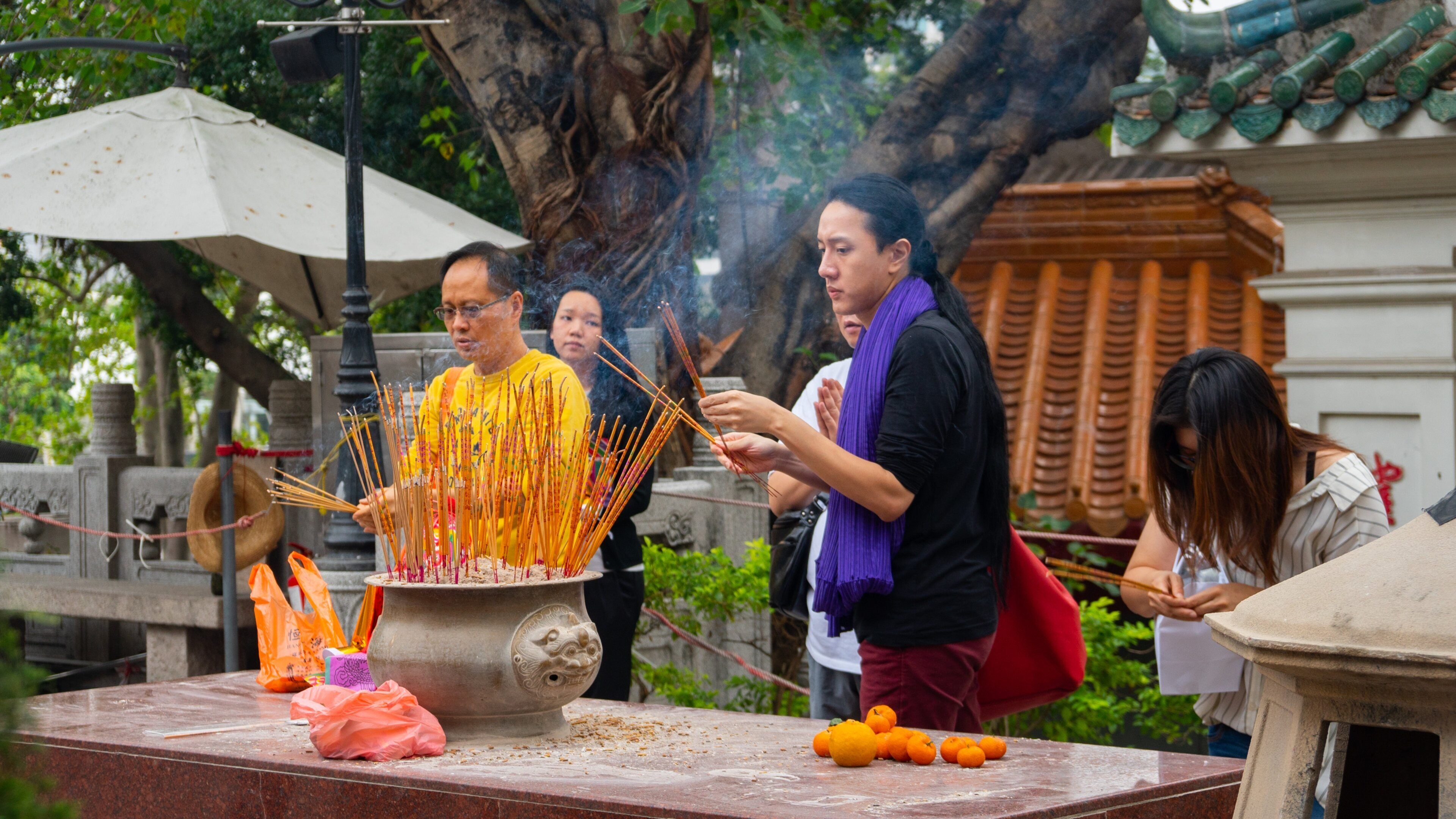 Wong Tai Sin Temple as well as a small group of people