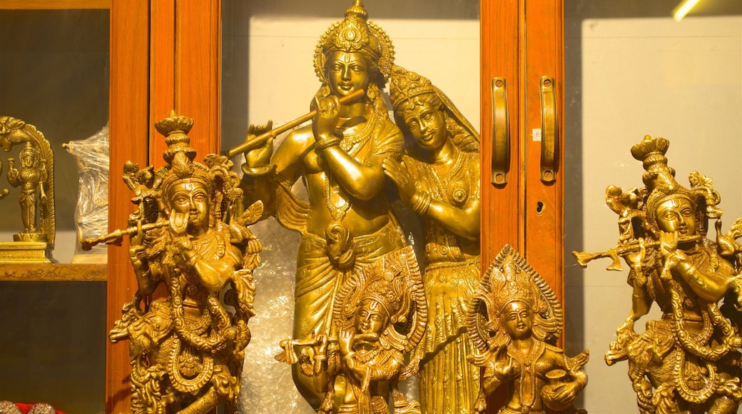 ISKCON Temple showing religious aspects and a statue or sculpture