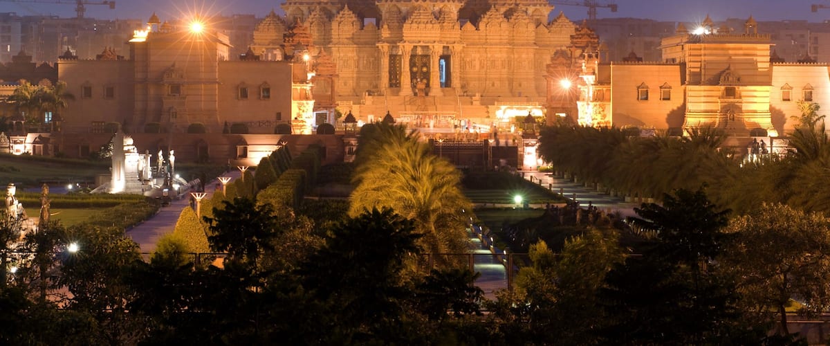 Swaminarayan Akshardham Temple featuring heritage architecture, religious elements and a park