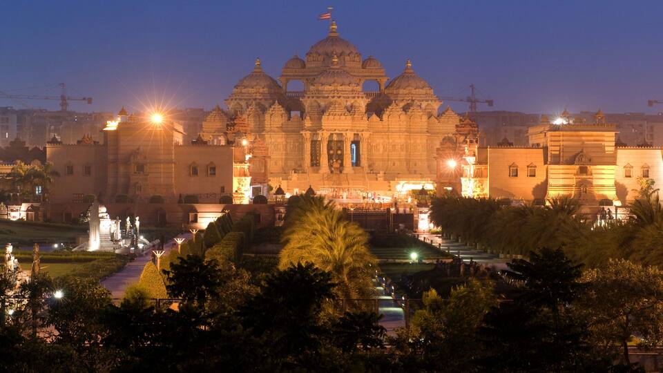 Swaminarayan Akshardham Temple featuring heritage architecture, religious elements and a park