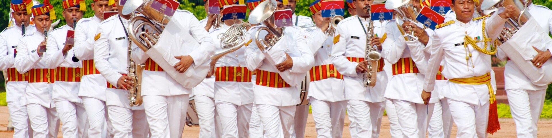 Presidential Palace showing performance art and music as well as a large group of people