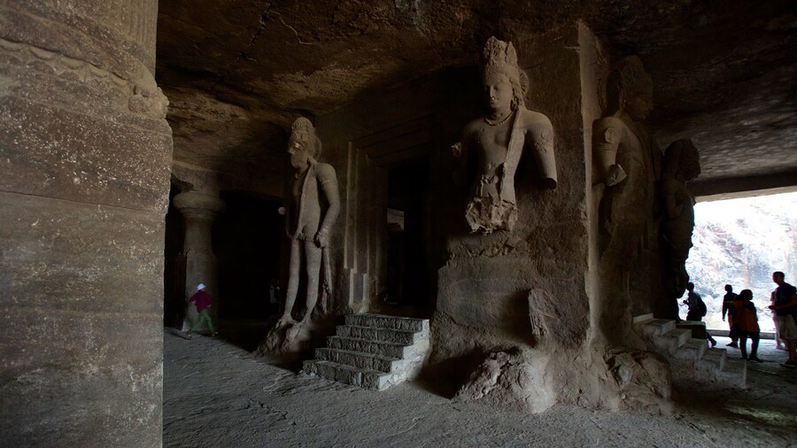 Elephanta Caves which includes a statue or sculpture, heritage elements and caves