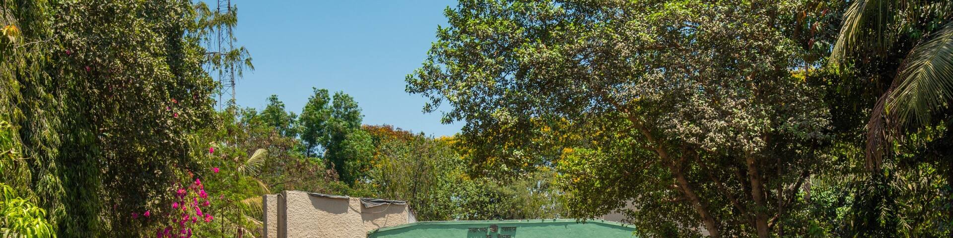 Sanjay Gandhi National Park showing signage and a garden